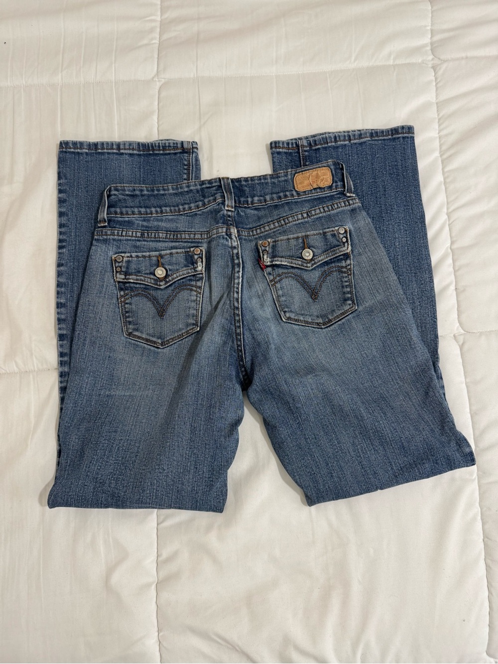 Levi's Women's Medium Blue Boot Cut Jeans with Back Pocket Detail